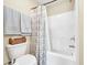 Bathroom area featuring a shower-tub combo and neutral walls at 837 Triple Ct. # 837, Myrtle Beach, SC 29588