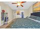 Bedroom featuring a ceiling fan and ample closet space at 837 Triple Ct. # 837, Myrtle Beach, SC 29588