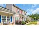 Exterior view of townhomes with well-maintained landscaping and inviting curb appeal at 837 Triple Ct. # 837, Myrtle Beach, SC 29588