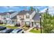 Attractive townhome with manicured lawn, landscaping, and ample parking, creating curb appeal at 837 Triple Ct. # 837, Myrtle Beach, SC 29588