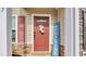 Inviting front door with decorative wreath and 'HOME Sweet HOME' sign at 837 Triple Ct. # 837, Myrtle Beach, SC 29588