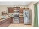 Kitchen area featuring stainless steel appliances and tile flooring at 837 Triple Ct. # 837, Myrtle Beach, SC 29588