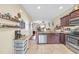 Spacious kitchen with stainless steel appliances and tile floors at 837 Triple Ct. # 837, Myrtle Beach, SC 29588