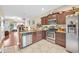 Open kitchen featuring stainless steel appliances and granite countertops at 837 Triple Ct. # 837, Myrtle Beach, SC 29588
