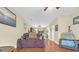 Open-concept living room featuring hardwood floors and natural light at 837 Triple Ct. # 837, Myrtle Beach, SC 29588