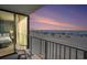 Relaxing balcony view overlooking the beach and ocean at sunset at 9400 Shore Dr. # 124, Myrtle Beach, SC 29572