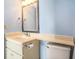 Cozy bathroom featuring a vanity with sink and mirror, and a toilet at 9400 Shore Dr. # 124, Myrtle Beach, SC 29572