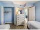 Bright bedroom with closet and dresser at 9400 Shore Dr. # 124, Myrtle Beach, SC 29572