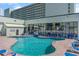 Outdoor pool area with lounge chairs and access to restrooms for convenience at 9400 Shore Dr. # 124, Myrtle Beach, SC 29572