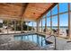 Indoor pool featuring an ocean view, vaulted ceilings, and full sized windows at 9550 Shore Dr. # 1523, Myrtle Beach, SC 29572