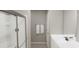 Modern bathroom with glass shower enclosure, towel rack, and vanity at 1120 Oak Meadow Dr., Conway, SC 29526