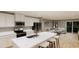 Modern kitchen with white cabinets, stainless steel appliances, and a large island with seating at 1120 Oak Meadow Dr., Conway, SC 29526