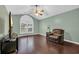 Relaxing bedroom featuring a ceiling fan and a comfortable leather chair at 137 Maiden Ln., Myrtle Beach, SC 29588