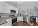 Well-equipped kitchen featuring granite countertops and stainless steel appliances at 137 Maiden Ln., Myrtle Beach, SC 29588