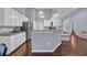 Open concept kitchen with stainless steel appliances, granite countertops, and ample storage space at 137 Maiden Ln., Myrtle Beach, SC 29588