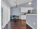 Dining area adjacent to kitchen with table and seating near sliding glass doors at 137 Maiden Ln., Myrtle Beach, SC 29588