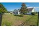 Well-maintained backyard features a fence and mature tree, providing a serene and private outdoor space at 1388 Gailard Dr., Conway, SC 29526