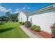 The home features a well-kept lawn, a clean white exterior, and a fenced backyard for privacy at 1388 Gailard Dr., Conway, SC 29526