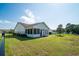 The property features a cozy screened porch and a fenced backyard, perfect for relaxation and outdoor activities at 1388 Gailard Dr., Conway, SC 29526