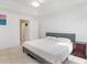Neutral bedroom with bed, side table and multiple closets and doorways at 1388 Gailard Dr., Conway, SC 29526