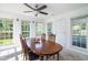 Bright dining area with natural light, neutral carpet, and seating for four at 1388 Gailard Dr., Conway, SC 29526