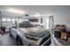 Attached garage featuring a SUV, ample lighting, storage cabinets and additional items at 1388 Gailard Dr., Conway, SC 29526