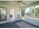 Relaxing screened porch with seating, an outdoor view, and ample natural light at 1388 Gailard Dr., Conway, SC 29526