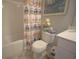 Bathroom featuring tub with shower, patterned shower curtain, and white vanity at 148 Splendor Circle, Murrells Inlet, SC 29576