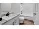 Bathroom featuring a white vanity, toilet, and shower at 1529 Bucksport Rd., Conway, SC 29527