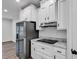 Well-lit kitchen featuring stainless steel fridge, range, and marble countertops at 1529 Bucksport Rd., Conway, SC 29527