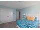 Comfortable bedroom with a full size bed, blue circle pattern bedding and a double door closet at 153 Stride Ct., Myrtle Beach, SC 29588