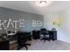 Spacious home office featuring two desks, rolling office chairs and custom wall lettering at 153 Stride Ct., Myrtle Beach, SC 29588