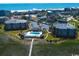 Aerial view of condo complex with a pool near the beach at 1582 South Waccamaw Dr. # 56, Garden City Beach, SC 29576