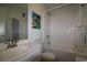Bathroom featuring a tub shower combo and a large vanity at 1582 South Waccamaw Dr. # 56, Garden City Beach, SC 29576