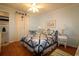 Charming bedroom featuring a ceiling fan, and a window with natural light at 1582 South Waccamaw Dr. # 56, Garden City Beach, SC 29576