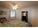 Comfortable bedroom with a ceiling fan, natural light and closet at 1582 South Waccamaw Dr. # 56, Garden City Beach, SC 29576