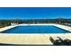 Outdoor pool with lounge chairs and scenic views at 1582 South Waccamaw Dr. # 56, Garden City Beach, SC 29576