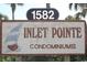 Inlet Pointe Condominiums sign featuring a sailboat graphic and the address number 1582 at 1582 South Waccamaw Dr. # 56, Garden City Beach, SC 29576