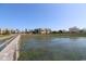 Picturesque waterfront view with a long boardwalk stretching into the water near buildings at 1582 South Waccamaw Dr. # 56, Garden City Beach, SC 29576