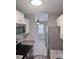 The kitchen features stainless appliances, granite counters, and white cabinetry at 1676 Citadel Ln., Myrtle Beach, SC 29577