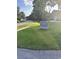 Citadel Place neighborhood sign on a grassy area with a residential street in the background at 1676 Citadel Ln., Myrtle Beach, SC 29577
