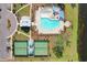 Aerial view of the community pool, clubhouse, and tennis courts at 1704 Perthshire Loop, Myrtle Beach, SC 29579