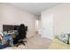 This carpeted flex room offers space for work or play with neutral walls and lighting at 1704 Perthshire Loop, Myrtle Beach, SC 29579
