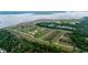 Aerial view of planned development including ponds, wetlands, roads, and new homes at 1716 Cravens St., Georgetown, SC 29440