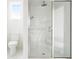 Bathroom featuring a glass shower and a window at 1716 Cravens St., Georgetown, SC 29440