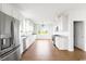 Spacious kitchen with white cabinetry, stainless steel appliances, and hardwood floors at 1716 Cravens St., Georgetown, SC 29440