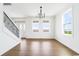 Beautiful living room with lots of light, stairs, and access to outdoor patio at 1716 Cravens St., Georgetown, SC 29440