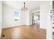 A bright dining room space leading into the kitchen with stainless steel appliances at 1716 Cravens St., Georgetown, SC 29440