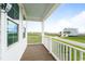 Enjoy coastal living on this front porch with views of the neighborhood and nearby coast at 1716 Cravens St., Georgetown, SC 29440
