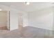 Spacious bedroom featuring plush carpet, an ensuite bathroom and large walk-in closet at 182 Foxford Dr., Conway, SC 29526